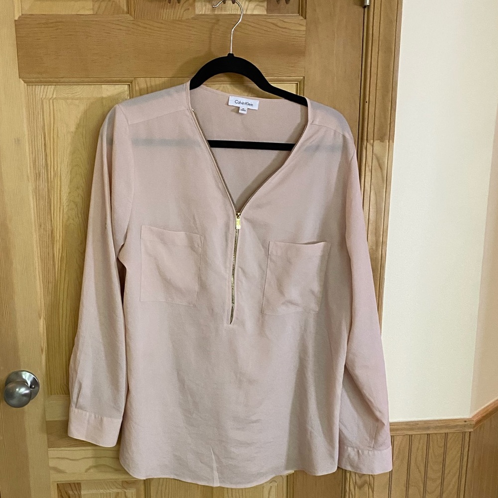 Women’s gold zippered blouse